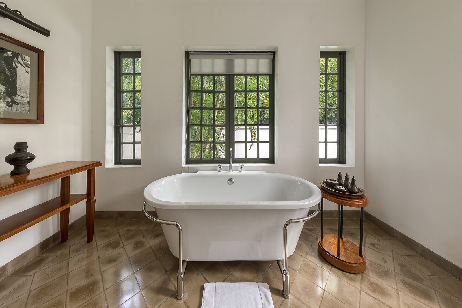 Bathroom with freestanding soaking tub and stone floor (stock inspiration photo)